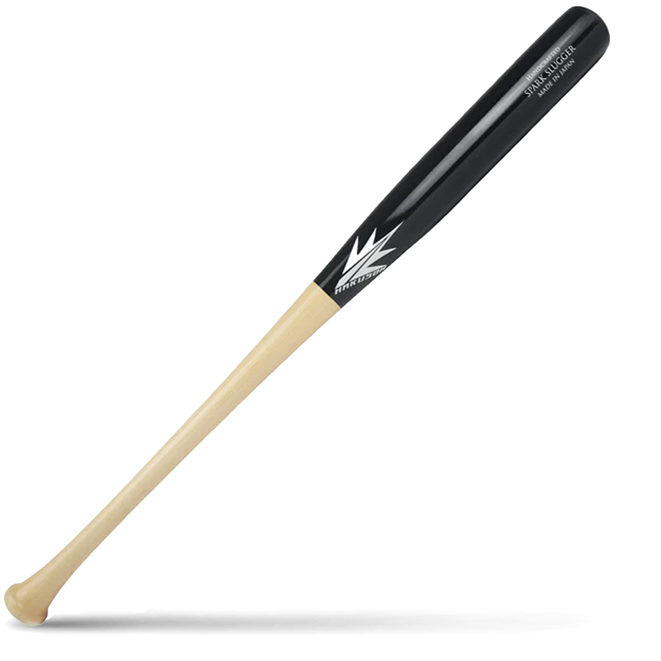 A two-tone maple wood baseball bat with a black barrel and a light natural wood handle, featuring Hakusoh branding and AP5 model markings, lying diagonally on a white background with a shadow underneath.