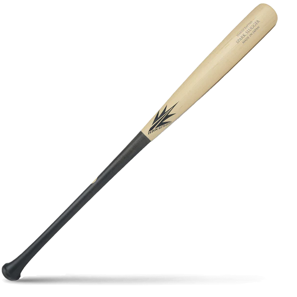 A two-tone maple wood baseball bat with a light natural wood barrel and a black handle, featuring Hakusoh branding and H271 model markings, lying diagonally on a white background with a shadow underneath.